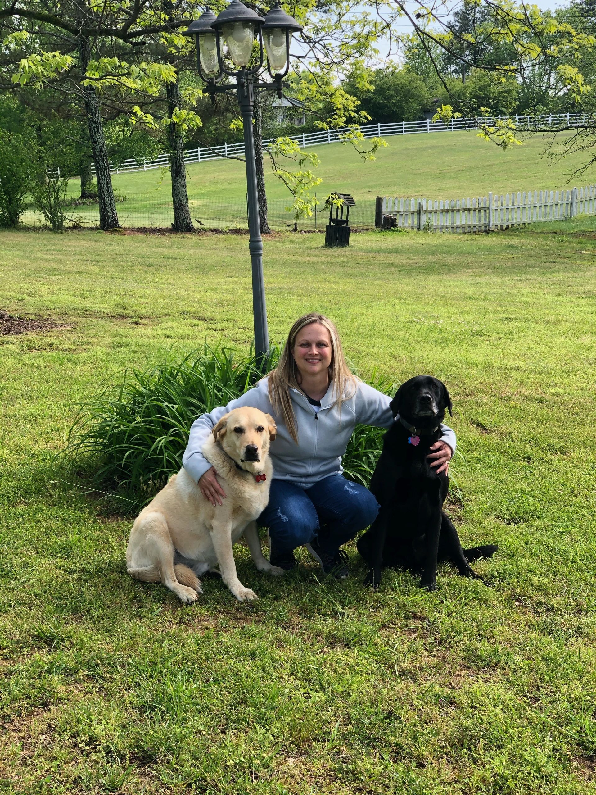 Dr. Brianna Spark, DVM, with her dog Remi at Grant Animal Clinic